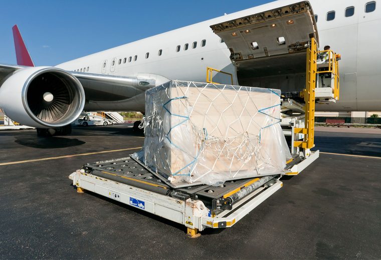 Air freight pallet being loaded into an aircraft